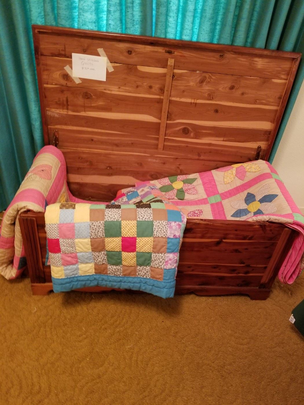 Cedar chest with handmade quilts