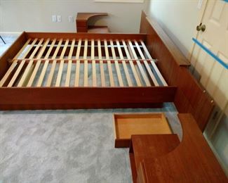 Teak wood bed frame with built in nightstands.  This excellent bed frame made in Denmark requires no box springs but if you want a higher bed you can add box springs. $345