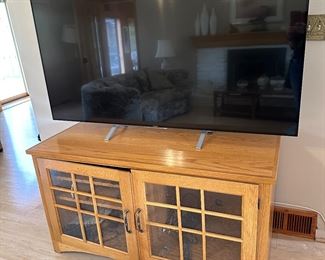 Sony TV about 72" and Wood mission style cabinet