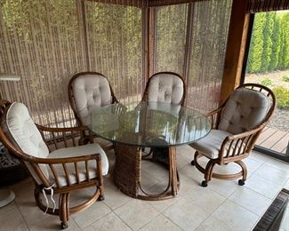 Rattan indoor patio set with glass table top