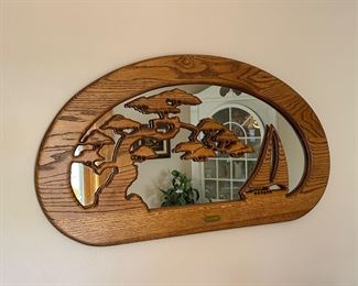 Wooden mirror with sailboat cutout