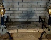 STUNNING 19th CENTURY ANDIRONS IN HEAVY WROUGHT IRON AND BRASS