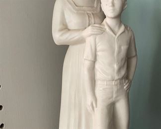 Hansen Classics Porcelain Figurine of Women Preparing Her Son. Photo 1 of 2.