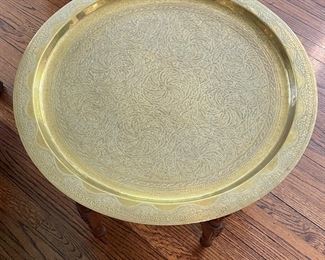 Brass Tray-Top Table with Carved Wood Base. Measures 25.5" D x 17" H. Photo 1 of 3.