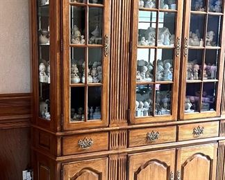 Two smaller end cabinets with two larger cabinets in the center.