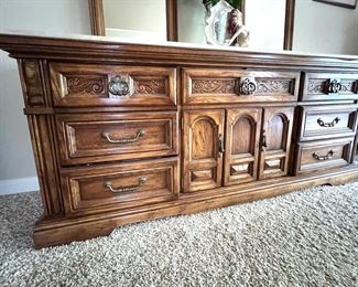 King size bed with Stearns and Foster mattress, two nightstands, ladies, dresser with mirror and armoire