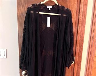 LOTS!!! of Beautiful Ladie's Clothes, lots of them are new or like new - sizes 1X, 2X and 3X 