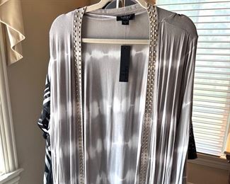 LOTS!!! of Beautiful Ladie's Clothes, lots of them are new or like new - sizes 1X, 2X and 3X 