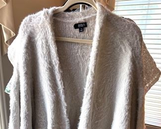 LOTS!!! of Beautiful Ladie's Clothes, lots of them are new or like new - sizes 1X, 2X and 3X 