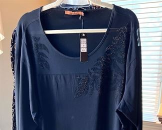 LOTS!!! of Beautiful Ladie's Clothes, lots of them are new or like new - sizes 1X, 2X and 3X 