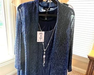 LOTS!!! of Beautiful Ladie's Clothes, lots of them are new or like new - sizes 1X, 2X and 3X 