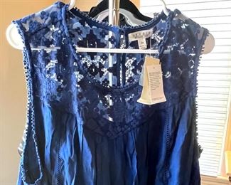 LOTS!!! of Beautiful Ladie's Clothes, lots of them are new or like new - sizes 1X, 2X and 3X 