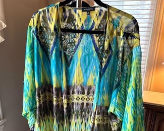 LOTS!!! of Beautiful Ladie's Clothes, lots of them are new or like new - sizes 1X, 2X and 3X 