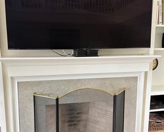 Samsung 75" flat screen television, fireplace screen 44" 