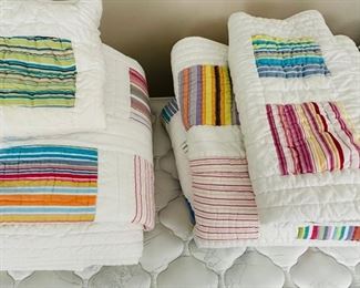 Two Crate & Barrel twin quilts with pillow shams