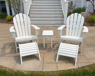Pair of Trex adirondack chairs with ottomans and side table 