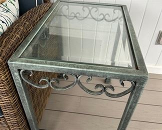 Glass topped metal table 16" w x 24" t  x 24" d 