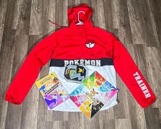MIXED POKÉMON LOT | Includes: XXS Pokémon trainer sweatshirt, Pokémon coloring book, Pokémon Alola Region Handbook, and large lot of assorted Pokémon cards.