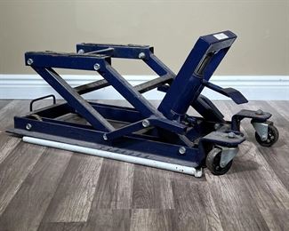 JACK STAND | Blue jack stand, good for quad ATV or motorcycle, tested functioning, no apparent maker, foot-pedal pump. -  l. 35 in x w. 17 in x h. 15 1/2 in in