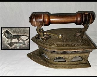 Antique Charcoal Sad Iron with Lion Inside