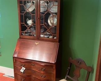 Mahogany China cabinet with claw feet
Needlepoint Chair