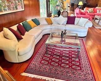 Scott Shuptrine sectional sofa, beautiful red area rug and metal and glass square coffee table.