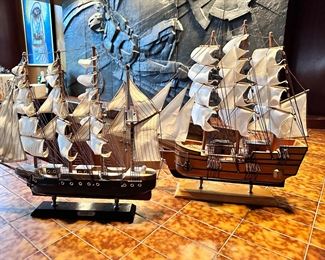 Two large wooden ship models.
