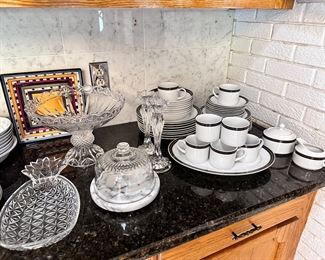Black & white china set & crystal serving pieces.