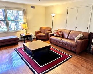 Three pieces of leather family room furniture.