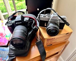Nikon camera, Sigma lenses & cases for sale as a set.  Minolta camera sold separately.