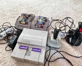 Untested Super Nintendo with games, (to be sold as a lot).