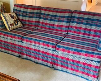 Red, blue, and beige upholstered sofa, perfect condition!