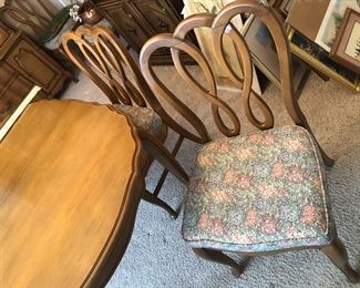 The six dining room chairs are in very good condition, including the upholstery.
