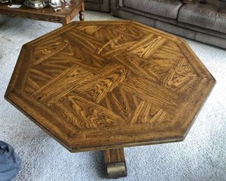 Mid-century octagonal pedestal table, parquet top. One of three matching pieces. Possibly Hekman. 44" across, 26" tall.