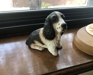 Dog figuring, one of several smaller animal figurines.