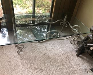 Rectangular glass-top table, 54"x30 1/2". Height 17 1/2". Both the top and base are very heavy. Has a matching square table (next photo).