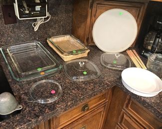 There are several pieces of Pyrex and several of Anchor  bakeware. There are two Pyrex casseroles (not pictured here) which have never been used.