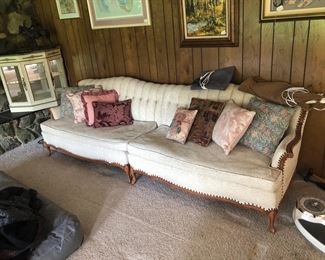 Mid-century two-piece couch. Each section is approximately 52" long, 29" tall and 32" deep.