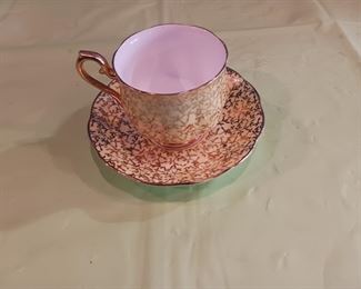 Mismatched gold chintz tea set of Royal Vale cup and Windsor Bone China saucer made in England