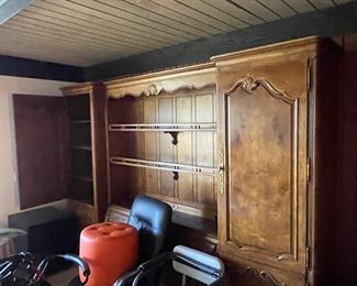 Upstairs are handicap items, an orange ottoman, art (off camera) and more...