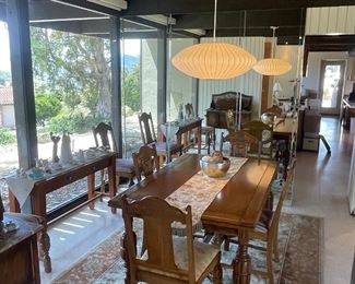 An antique commode (to left out of view) console table by World Market, and a beautiful antique dining room table w/ 6 chairs...