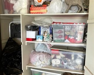 Cupboards are packed holiday decor, Christmas trees, & more!