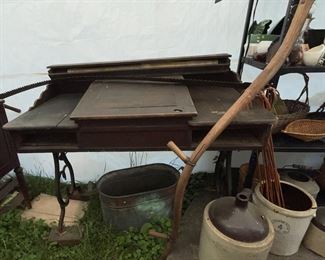 This is such an awesome fine - wrought iron legs on large desk top - for a clerk we believe.