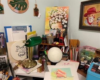 Corner desk, wood organizer, desk lamp, canvas, original art work and office supplies