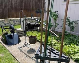 Garden tools garden tool storage unit, wheelbarrow, iron pot, fire wood storage