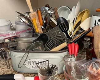Lots of vintage kitchen utensils, wood and plastic