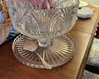 This punch bowl is beautiful and can be changed into a domed cake plate!!