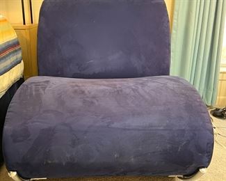 blue armless rocking chair