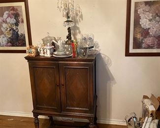 Antique butler cabinet for “things a server needs “ on the way from the kitchen to the formal dining room…