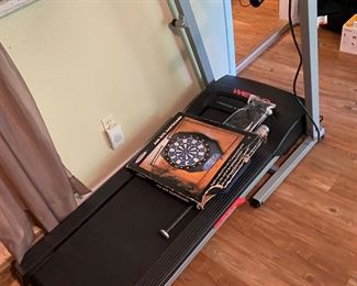 Treadmill , now located on the patio for te estate sale but it’s always been kept inside.